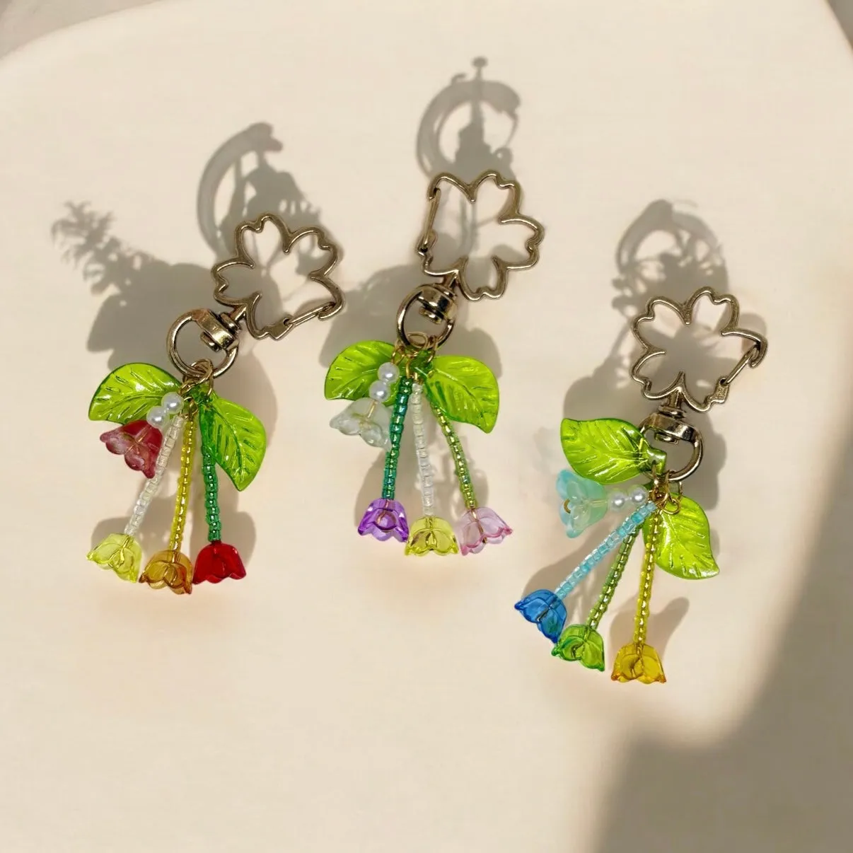 Beaded flowers bag charm | key chain | golden chain with flowers and leaf