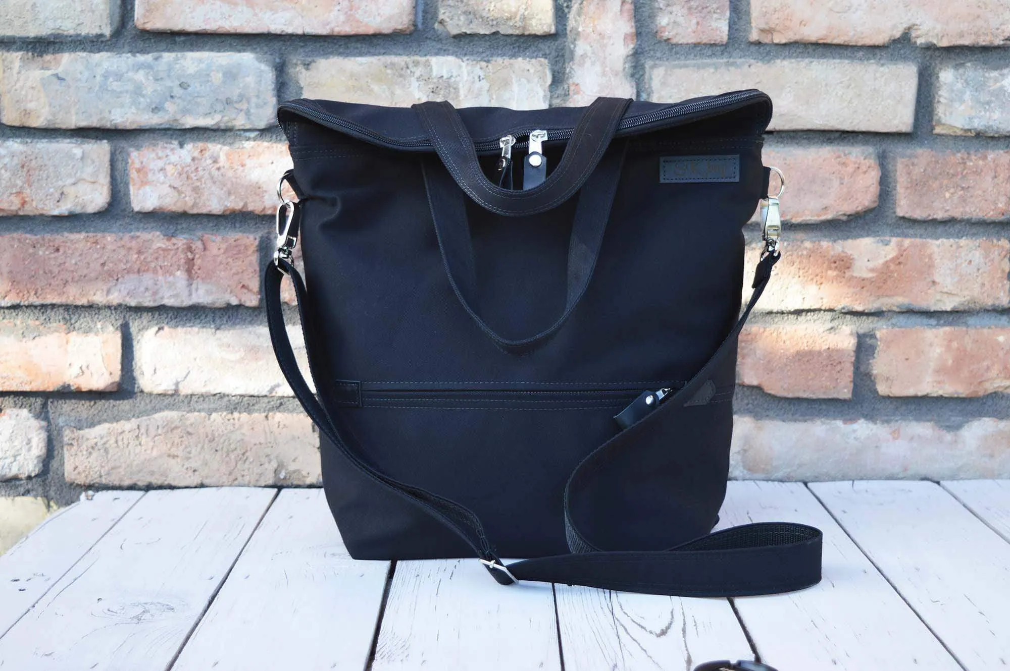 Black Traveller Waterproof Backpack, Vegan Cross Body Bag | Aris Bags