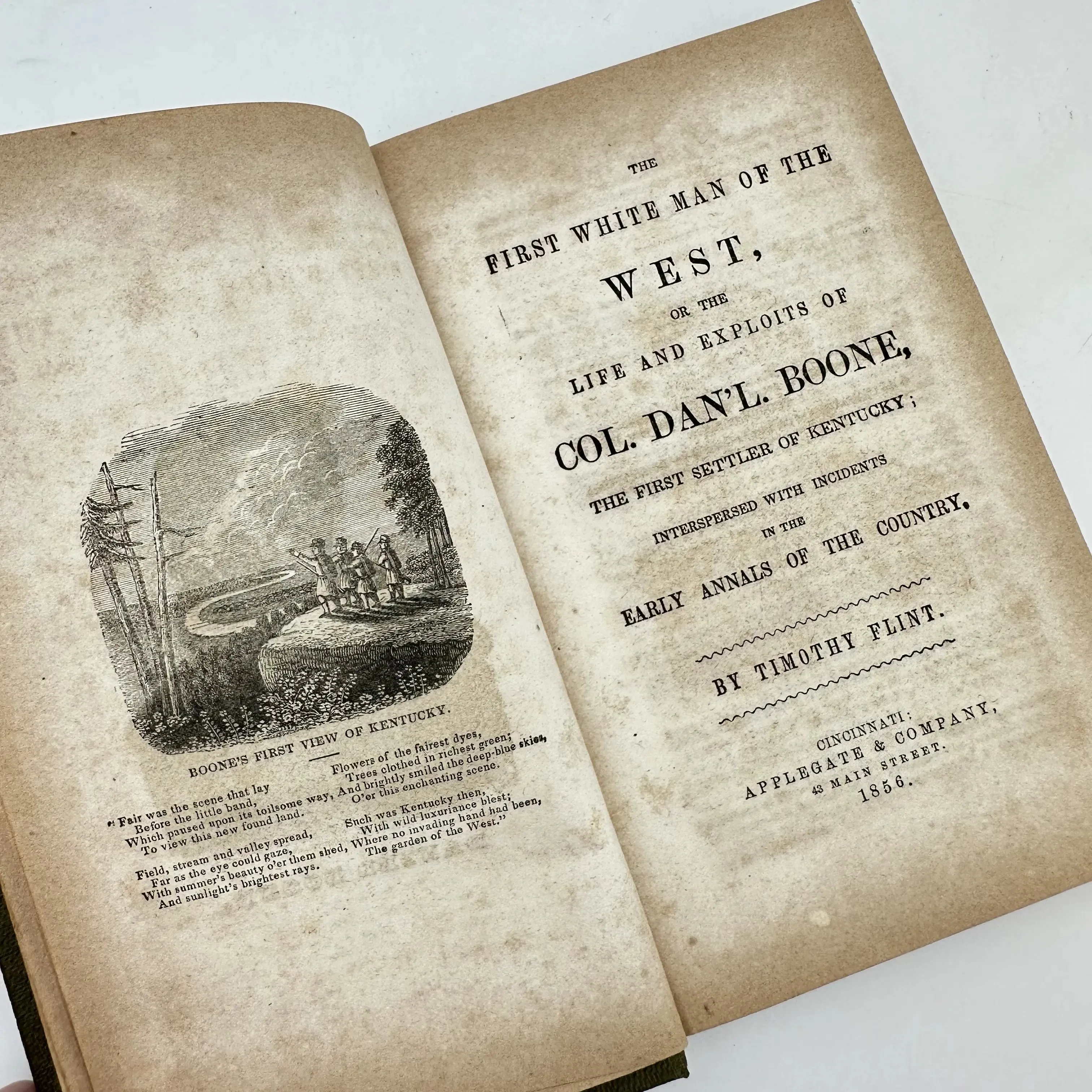 Books from the 1800s: Thirteen Months in the Rebel Army (1862), White Slavery in the Barbary States (1853), and Daniel Boone (1833)