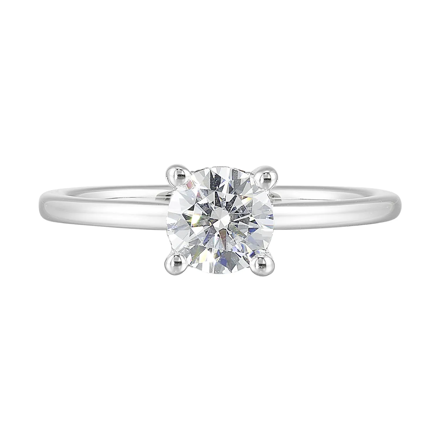 The dazzling solitaire diamond take center stage. The petite band adds to the sleek, classic look.