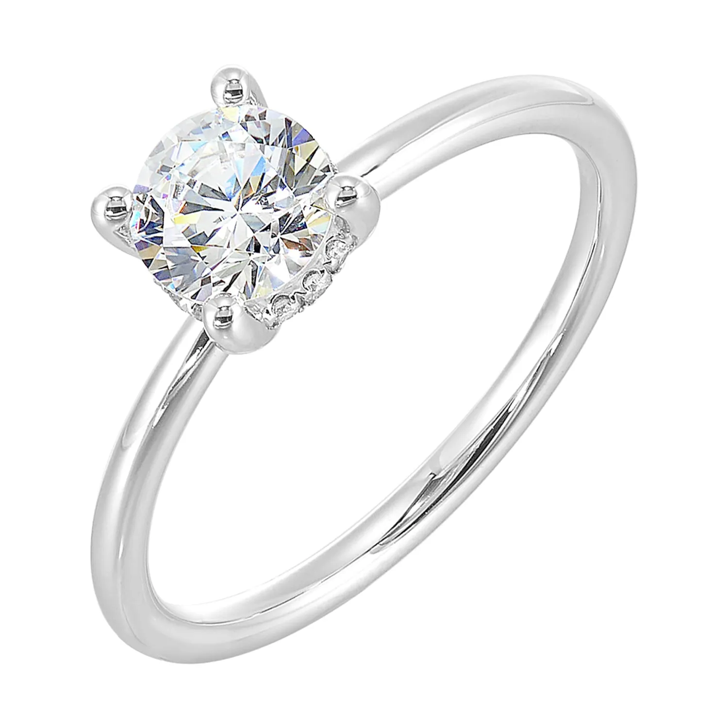 The dazzling solitaire diamond take center stage. The petite band adds to the sleek, classic look.