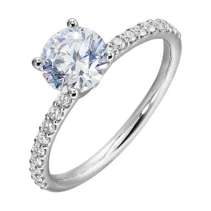 This solitaire ring boasts a dazzling micro pave on shank, offering sparkle to this delicate design offers timeless look.