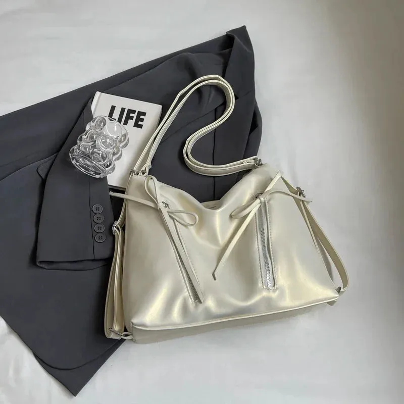 VAIGE Silver Small Bow PU Leather Shoulder Bag with Zipper Closure and Flap Pocket, Soft Baguette Shape, Versatile Crossbody Design