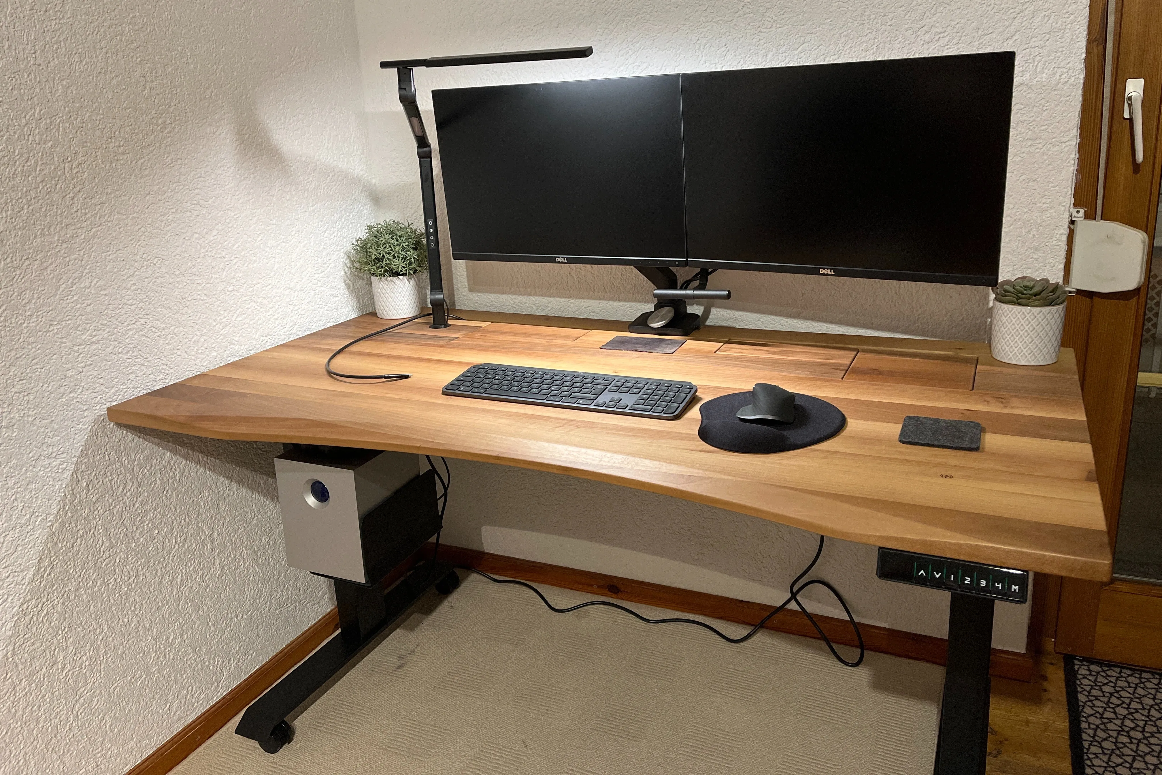 Walnut standing desk with cable management unit