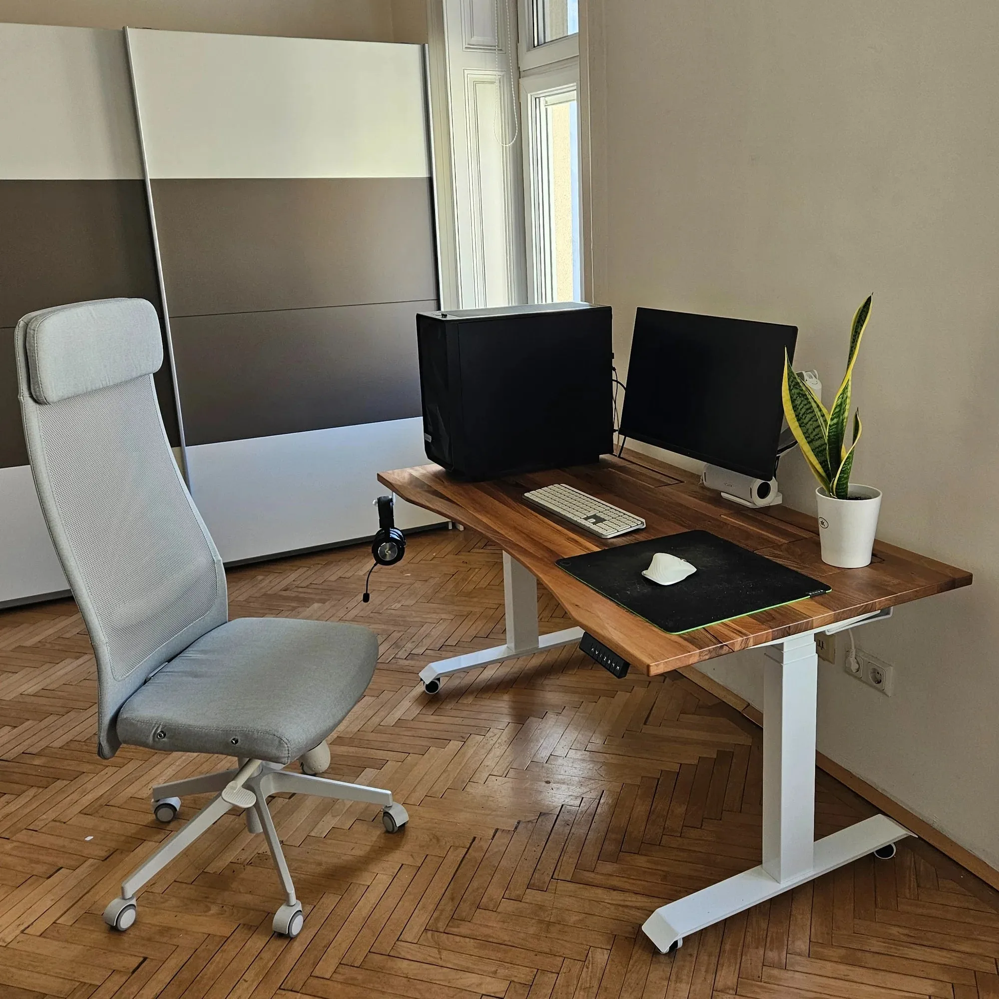 Walnut standing desk with cable management unit